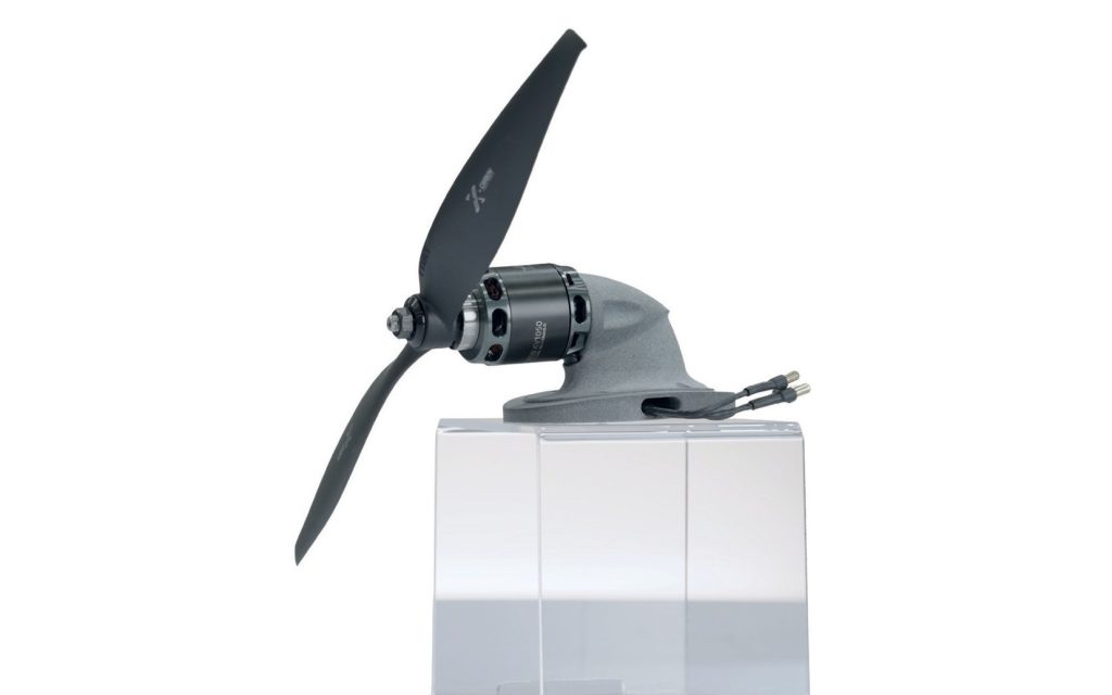 A 3D printed drone engine mount fitted with a propeller and motor.